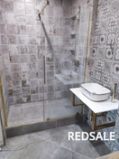 Изготовление душ-кабины с монтажом сантехнической посуды и облицовкой.