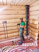 Монтаж водяного теплого пола в бане из рубленого бревна .