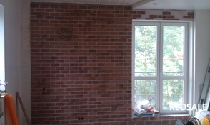 Укладка декоративного камня в кухне - столовой.