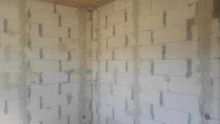 Установка маяков для штукатурки стен