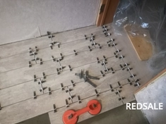 Укладка керамогранита 15/60 на пол. С частичным выравниванием пола.